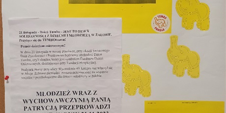 Powiększ grafikę: Plakat promujący akcję Tumbo pomaga w budynku bursy przy Ul. Wyzwolenia 49 